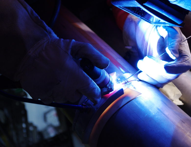 image of welder welding